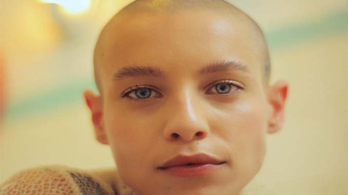 Bald Green Eyed Woman