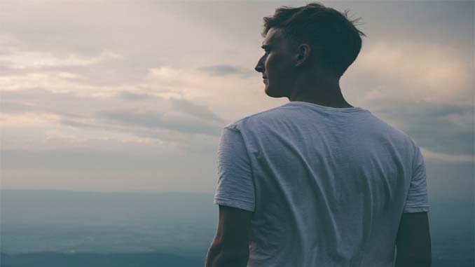 Man Looking Off In The Distance