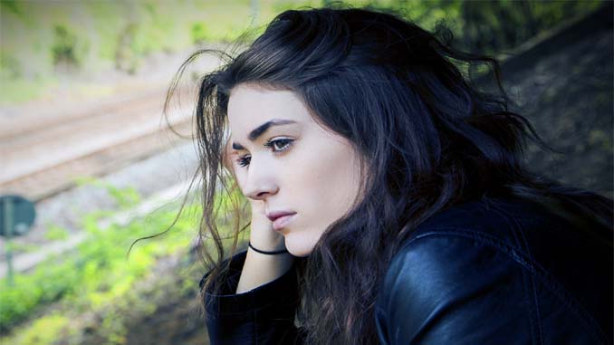 Young Woman Looking Off In The Distance