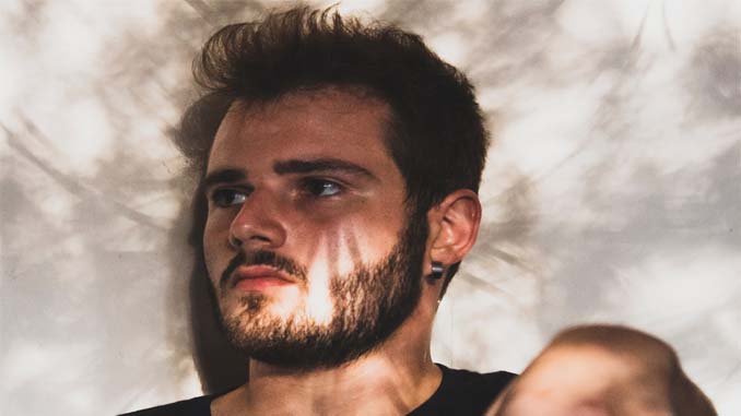 Man Looking Off In The Distance