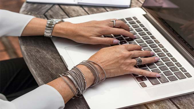 Woman Working On Her Laptop