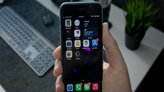 Man Holding His Cellphone