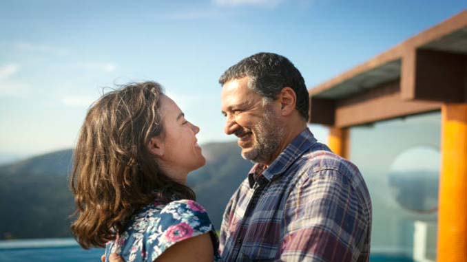 Mature Man Hugging A Younger Woman
