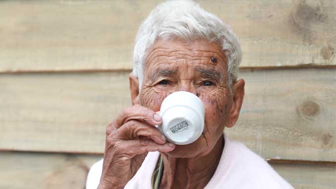 Elderly Gentleman Enjoying His Espresso