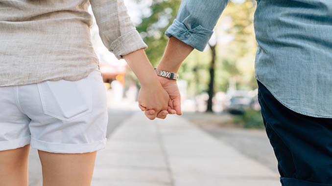 Man And Woman Holding Hands