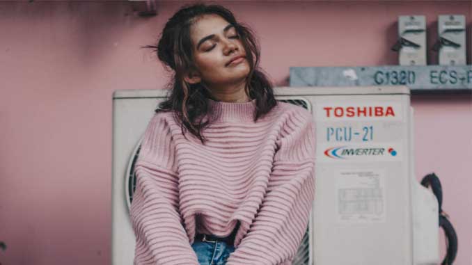 Smiling Woman With Her Eyes Closed