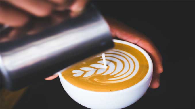 A Cup Of Espresso With A Plant Design