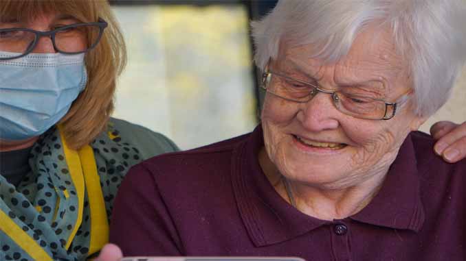 Woman Embracing Her Mother