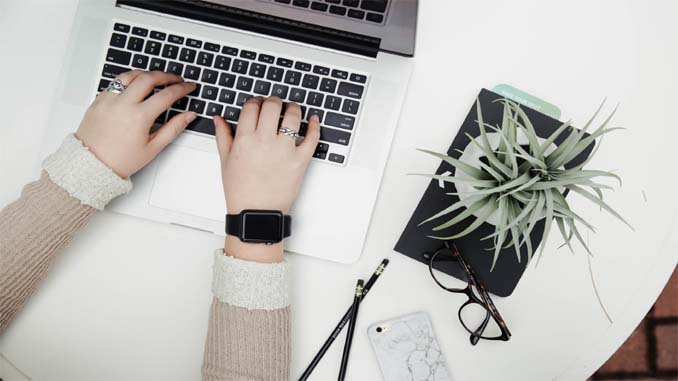 Woman Working On Her Laptop