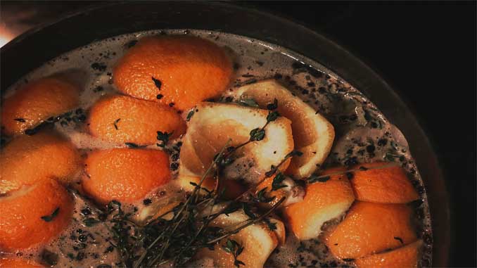 Orange Rinds And Various Seasonings In A Pan
