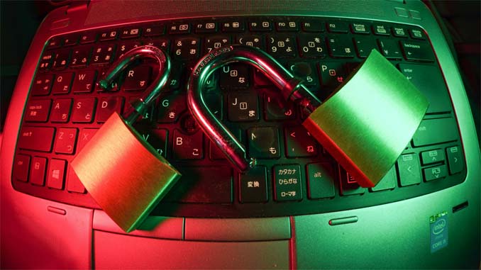 Two Padlocks On A Keyboard