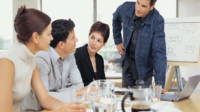 Four People Discussing Their Business