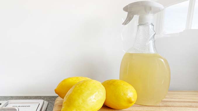 Spray Bottle With A Lemon Cleaner In It