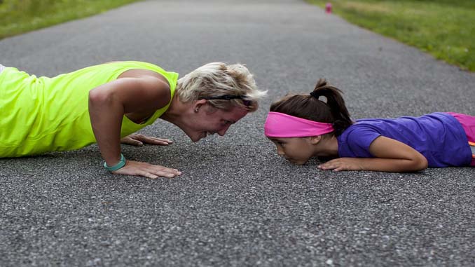 Mom And Child Doing Push Ups