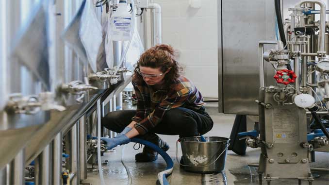 A Woman Maintaining Machines