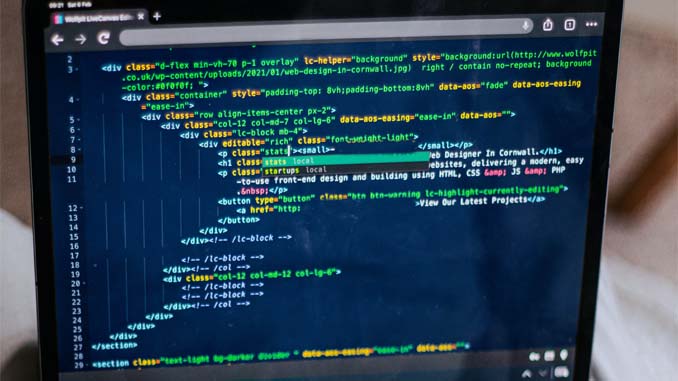 Laptop Showing Computer Code