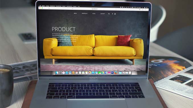 Laptop With A Couch Displayed On The Screen