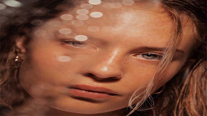 Woman Looking Into The Camera