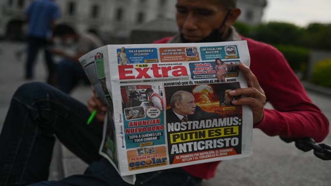 Man Reading A Newspaper