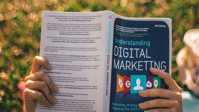 Woman Reading A Digital Marketing Book