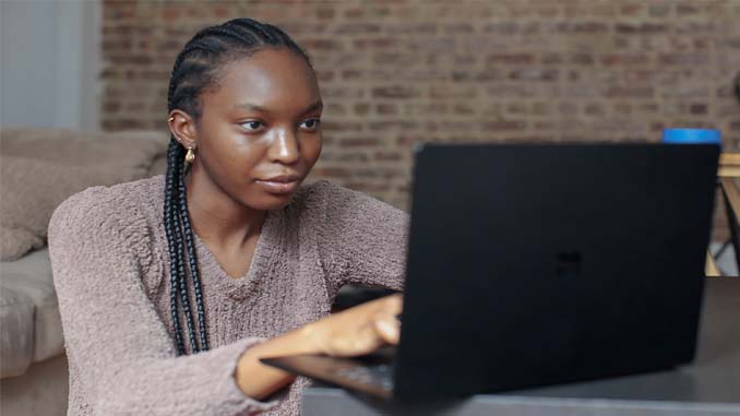 Woman Working On Her Laptop