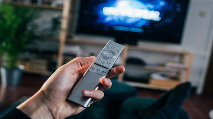 Man Holding A Remote Control