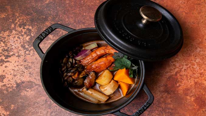 Pot On The Counter With Cooked Veggies