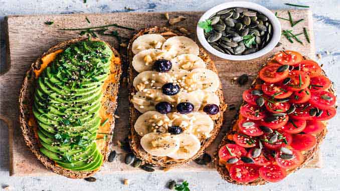 Rye Bread With Avocado Bananas Tomatoes And Seeds