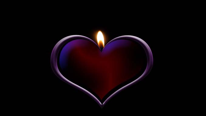 A Heart With A Candle Coming Out Of It