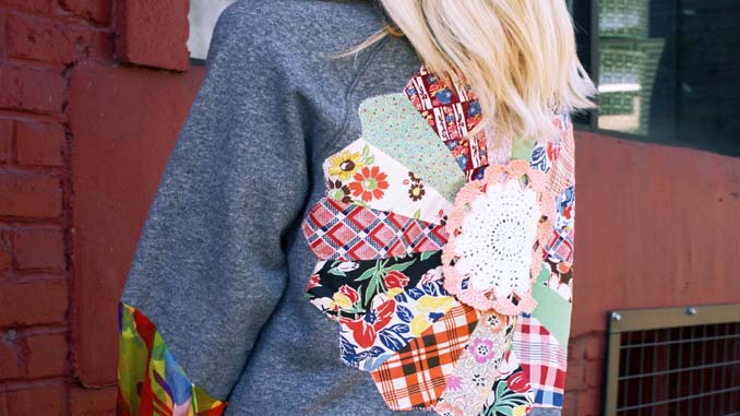 Woman With Recycled Cloth Pattern On Her Sweatshirt