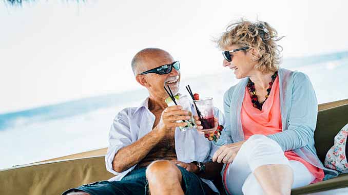 Middle Aged Man And Woman Having A Drink
