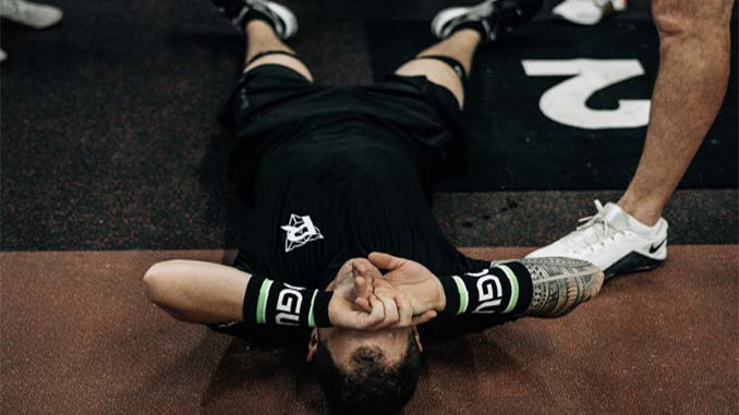 Injured Athlete Laying On Floor