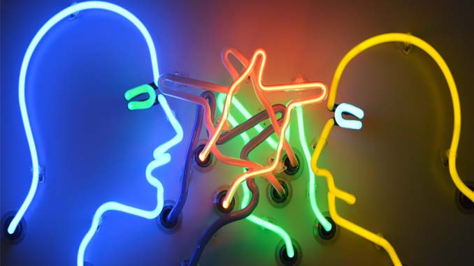 Neon Sign With Two People Arguing