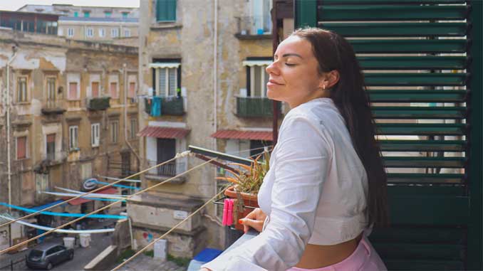 Woman On Her Balcony