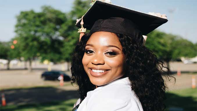 Graduate In Her Cap And Gown