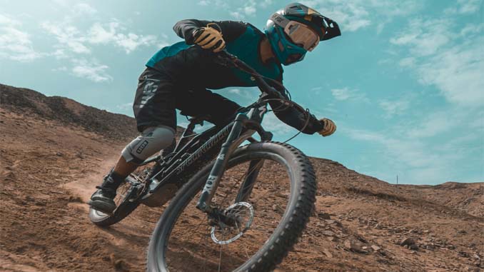 Man Riding Down A Hill