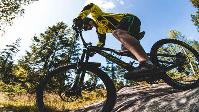 Man Riding Down A Hill