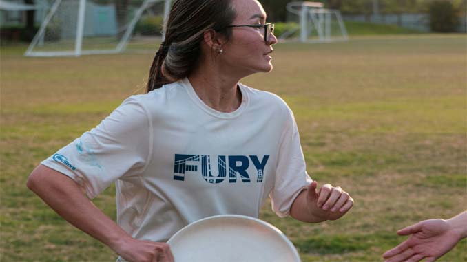 Woman With A Frisbee