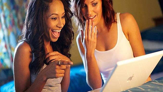 Two Women With A Laptop