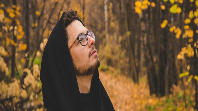 Man In Hoodie Looking Up