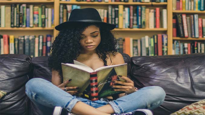 Woman Reading In A Bookstore