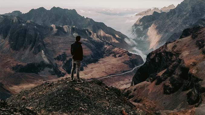 Man Enjoying A Mountain View
