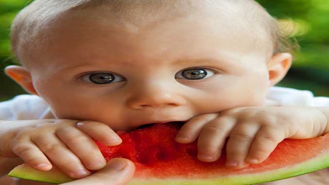 Baby Enjoying Some Watermelon