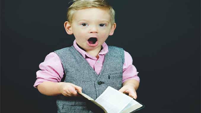 A Young Boy With An Expression Of Shock