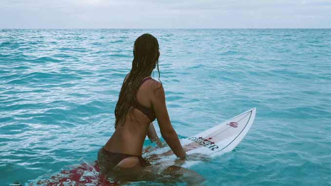 Woman Waiting For A Wave