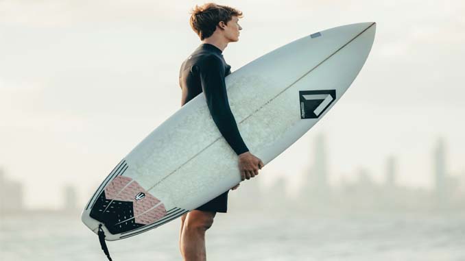 Young Man Watching The Waves