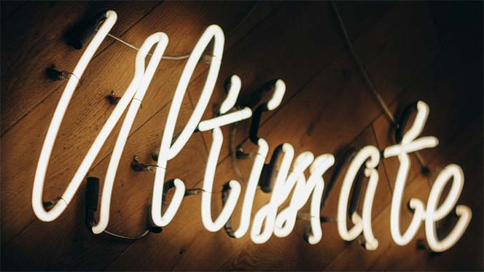 The Word "Ultimate" In Neon Lights