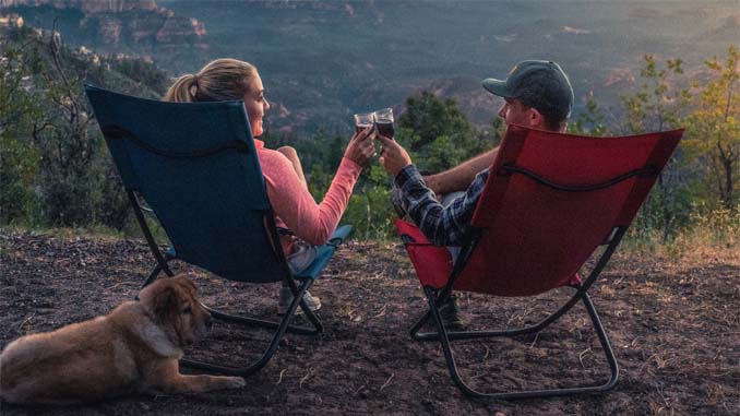 Couple At A Campground Drinking Wine